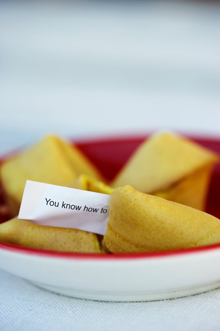 Fortune cracker where one is opened and the motto reads 'You know how to'.