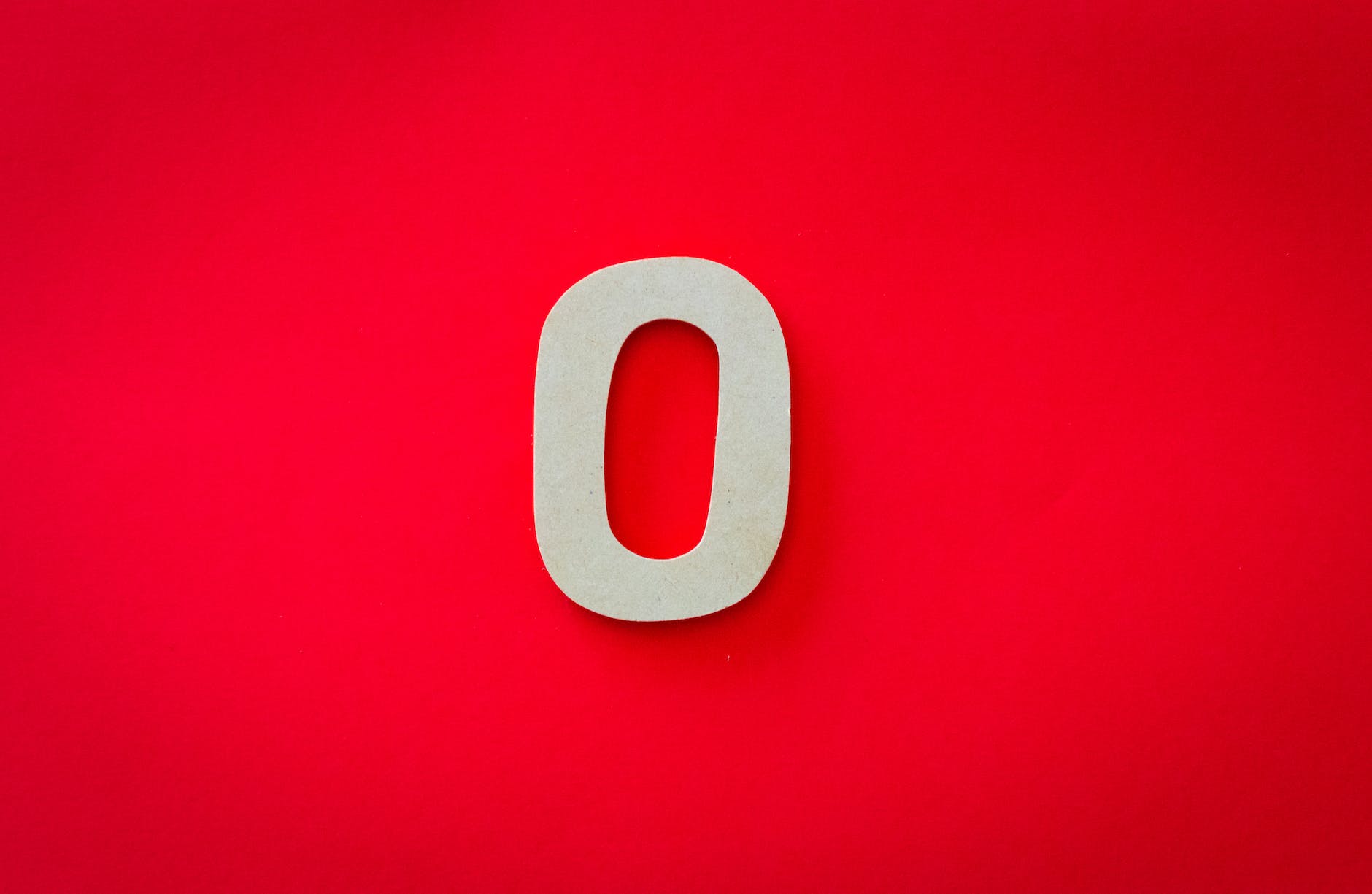 Number zerp against a red background