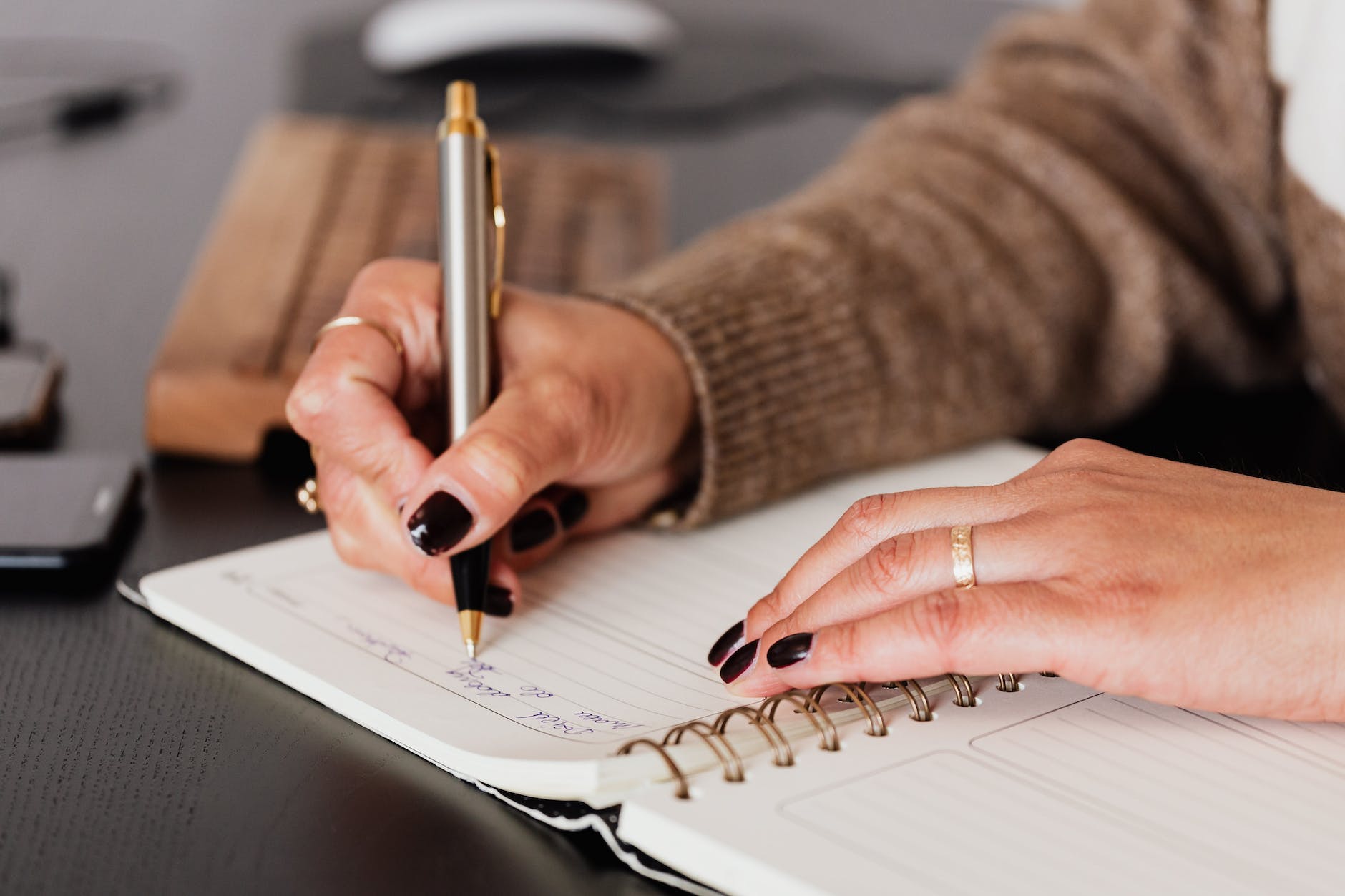 Woman writing in a journal