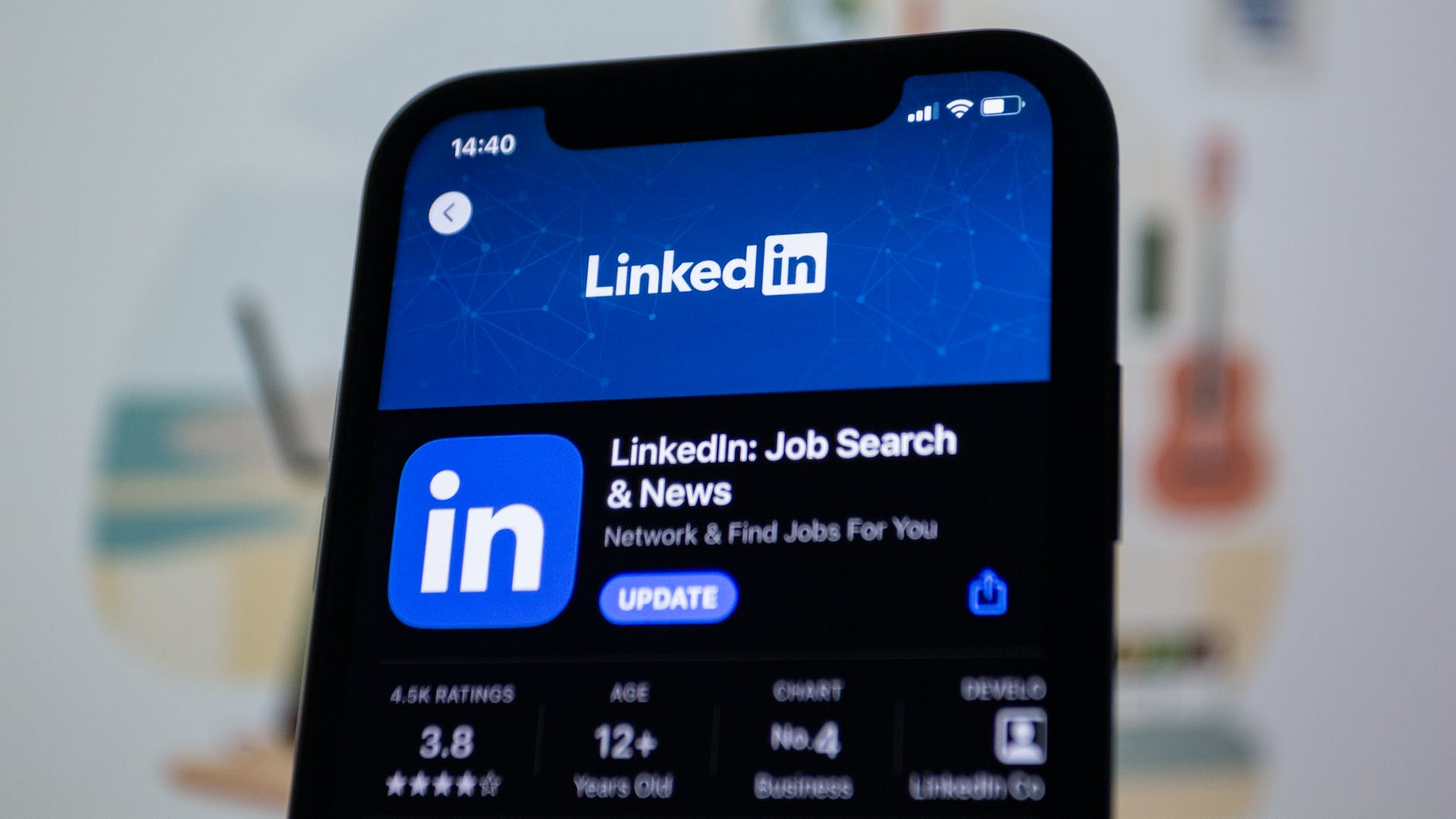 Mobile phone displaying the LinkedIn app in the App store