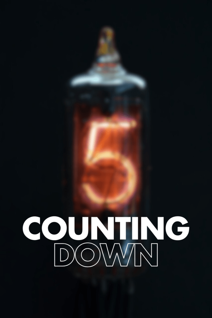 Nixie tube displaying the number 5 with the text 'COUNTING DOWN