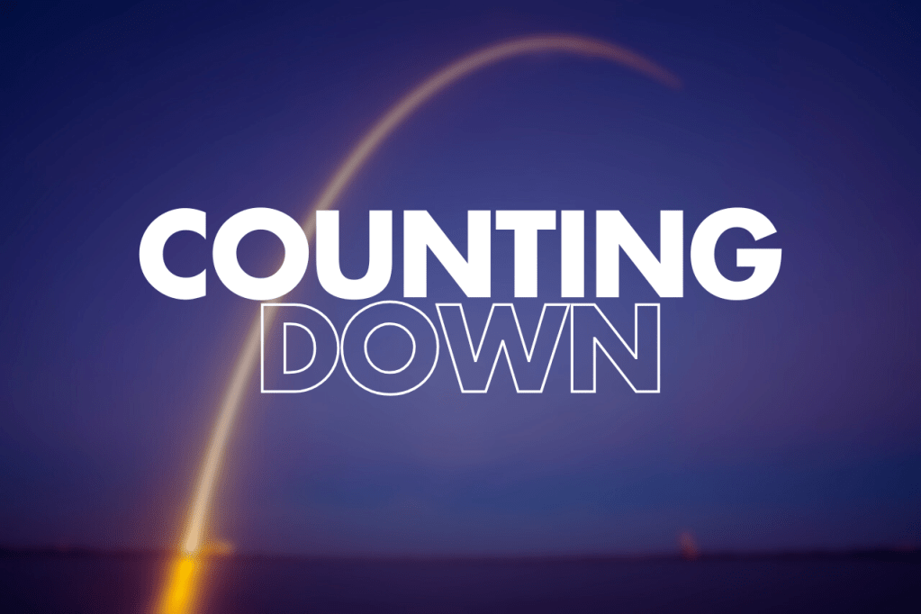 Stylised words Counting Down over a blurred image of a rocket taking off at night