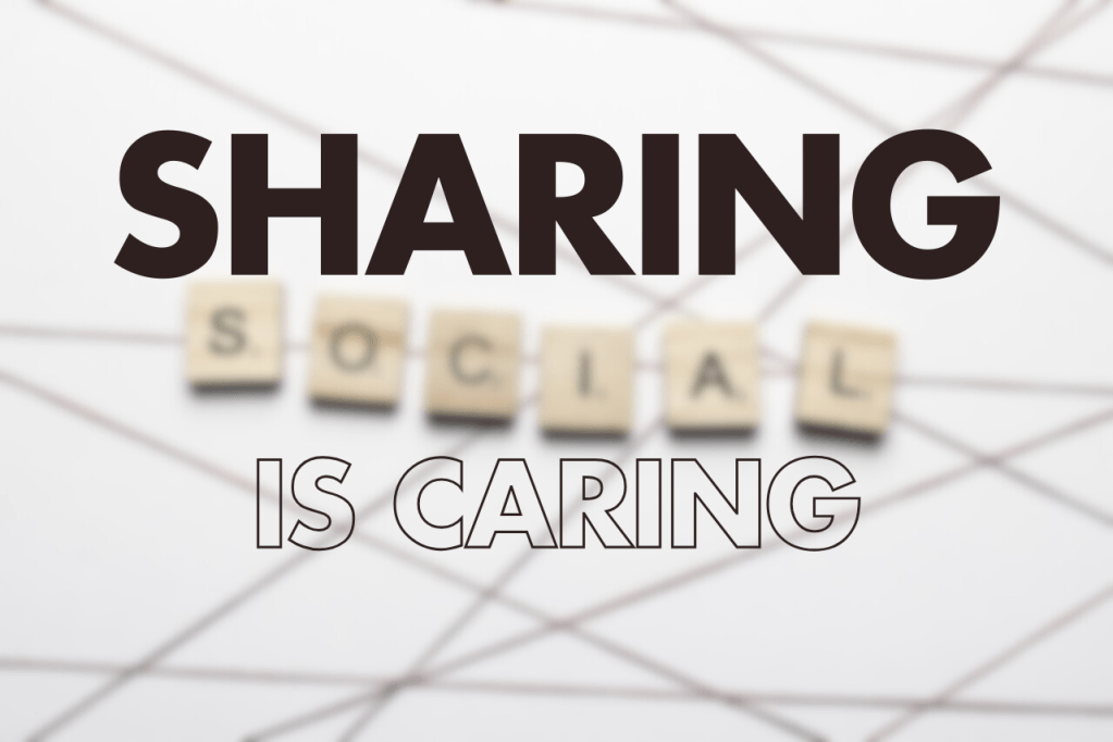 Text 'SHARING IS CARING' with the word 'SOCIAL' spelled out in wooden blocks