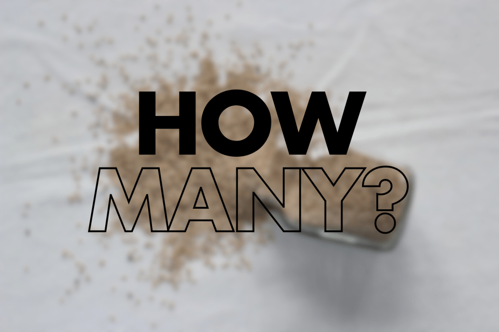 A graphic with bold text reading 'HOW MANY?' overlaid on a blurred image of spilled flax seeds. The word 'HOW' appears in solid black letters while 'MANY?' is shown in outlined text. The spilled flax seeds create a scattered pattern across a white surface