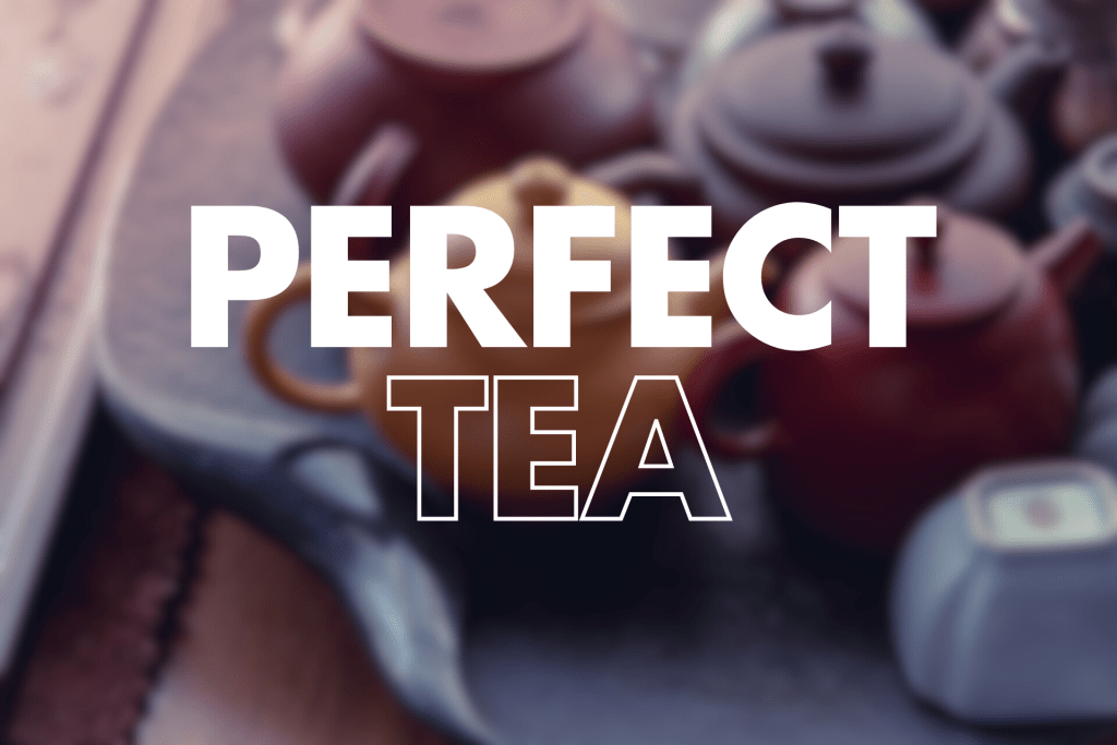 Blurred group of clay teapots arranged on a round tray, with bold white text reading “PERFECT TEA.”







