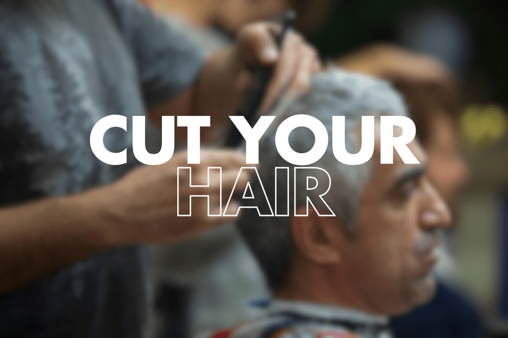 This image shows a blurred background scene of a barbershop, where someone is getting a haircut. Over this background, there's bold white text that prominently displays "CUT YOUR HAIR". The word "HAIR" appears to be outlined rather than filled in with white, creating a distinctive visual contrast with "CUT YOUR".