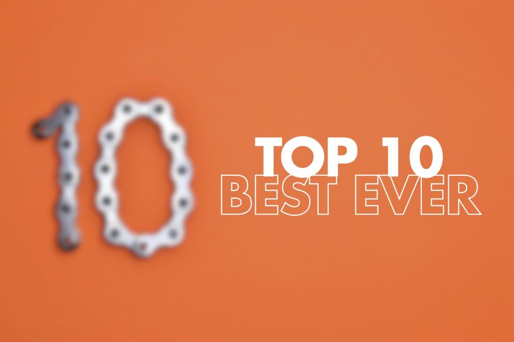 The image shows a bright orange background with the number "10" displayed in large metallic or chrome-style 3D lettering on the left side. To the right of the number, white text reads "TOP 10 BEST EVER" in bold, sans-serif typography. The "TOP 10" text appears in solid white, while "BEST EVER" is styled with outlined letters. 