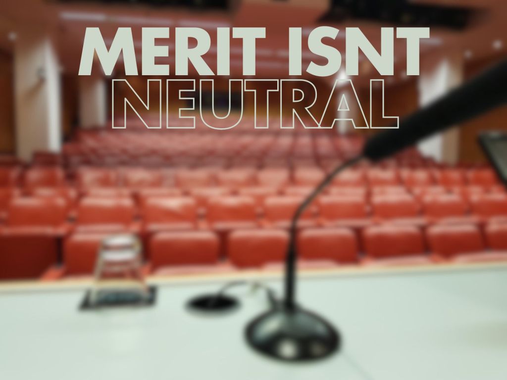 A blurred image of an empty auditorium with red seats, featuring the phrase "MERIT ISN'T NEUTRAL" in large, bold white text.