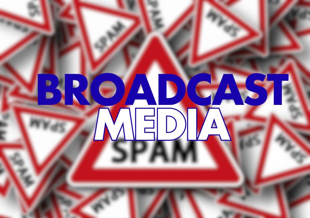 A blurred image filled with warning signs labelled "SPAM," featuring the words "BROADCAST MEDIA" prominently displayed in large, bold blue and white text.