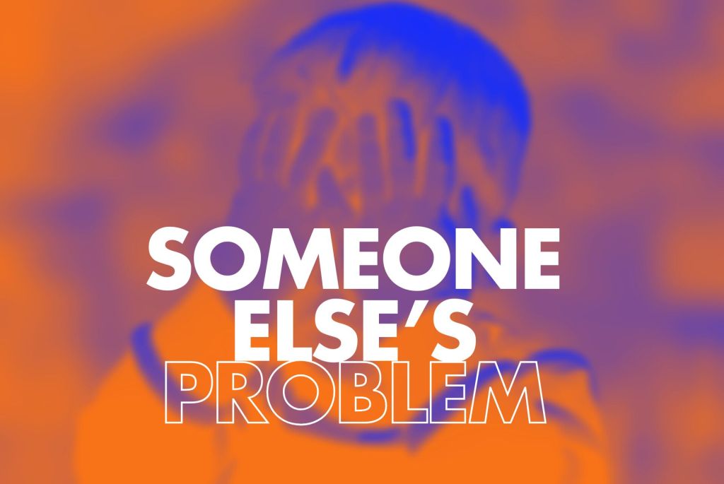 Alt Text: An abstract image with a blurred silhouette of a child hiding their eyes with their hands. The background features a gradient of orange and blue hues. Prominently displayed in the foreground is the text "SOMEONE ELSE'S PROBLEM" in bold white letters, creating a striking visual contrast.

