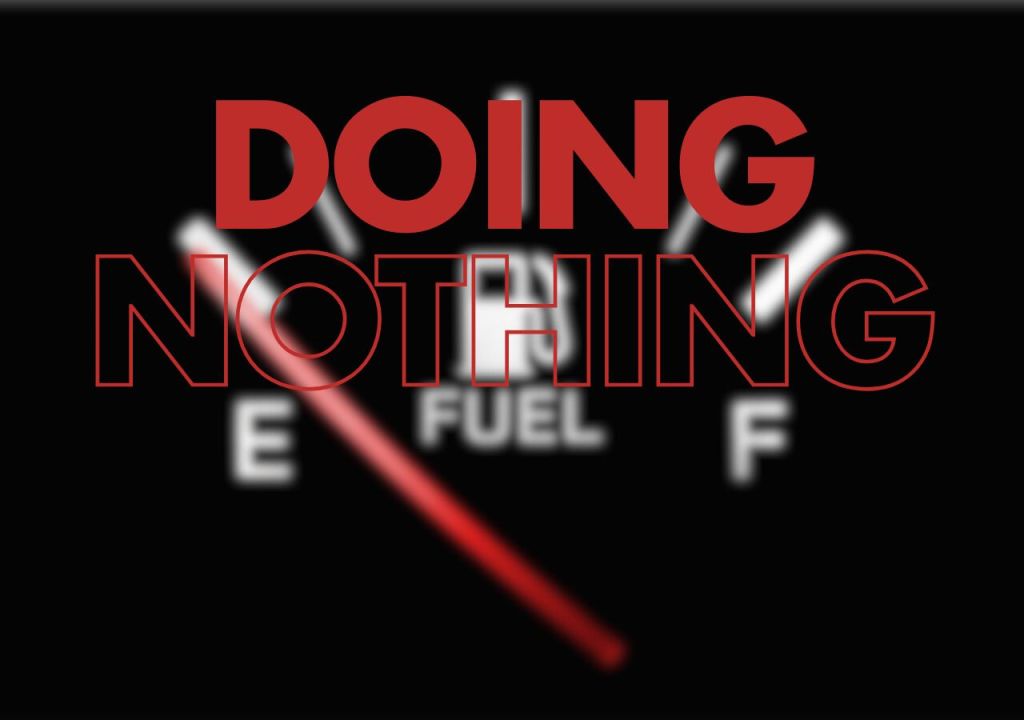 The image features a blurred fuel gauge against a dark background. The fuel gauge displays the words "E" (empty) and "F" (full), with a needle pointing towards the "E" side. Overlaying this is the phrase "DOING NOTHING" in bold, red letters, which stands out prominently against the blurred gauge. The overall design conveys a sense of emptiness or inactivity.