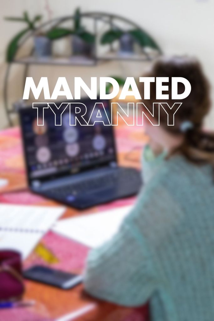 A person sitting at a table, focused on a laptop with some papers and a phone nearby. The foreground has the phrase "MANDATED TYRANNY" in large, bold text.

