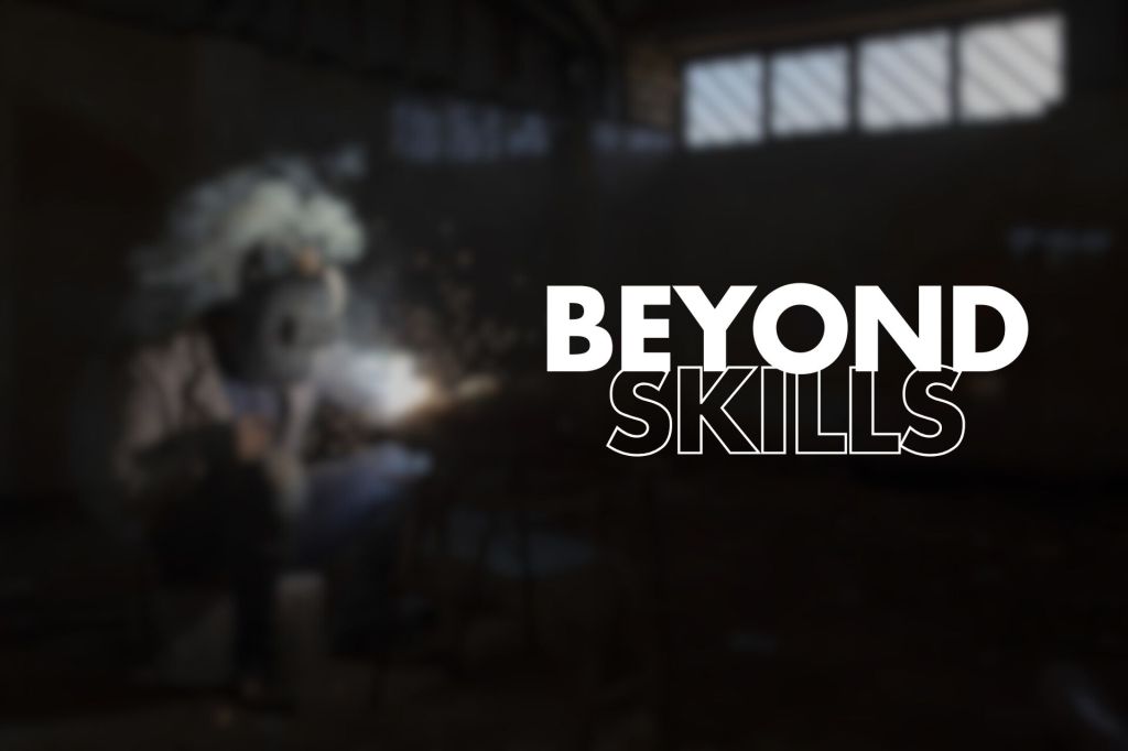 A blurred image of a person wearing a welding helmet, with bright sparks flying, overlayed with bold text "BEYOND SKILLS".