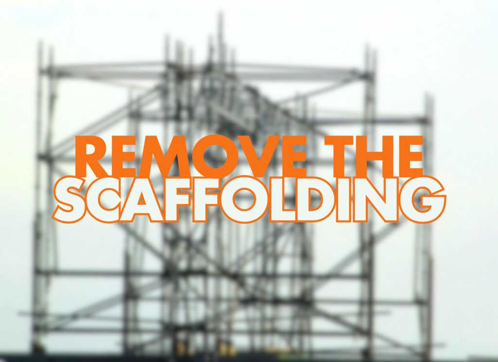 The image features a blurred background of scaffolding with bold text overlay that reads "REMOVE THE SCAFFOLDING" in a striking orange font.
